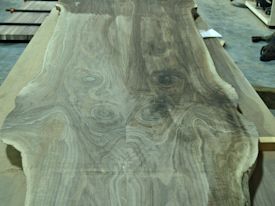 Working on a book-batched TX Walnut table top with wane edges.  Check out the fantastic swirls in this wood!
