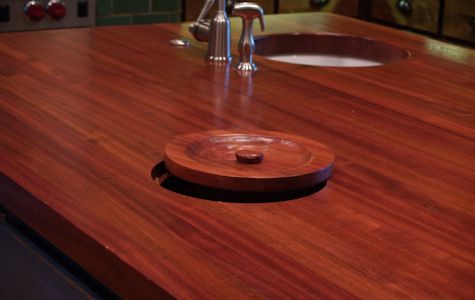 Jatoba Wood Island Countertop with Integrated Trash Hole and Hand Carved Trash Lid