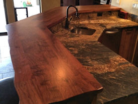 Mesquite face grain bar top with Waterlox Satin Finish.