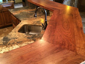 Mesquite face grain bar top with Waterlox Satin Finish.