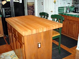 Pecan edge grain custom wood island countertop.
