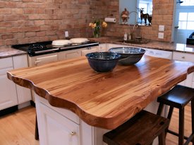 Reclaimed Longleaf Pine face grain custom wood island countertop.
