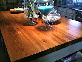 Reclaimed Longleaf Pine face grain custom wood island countertop.