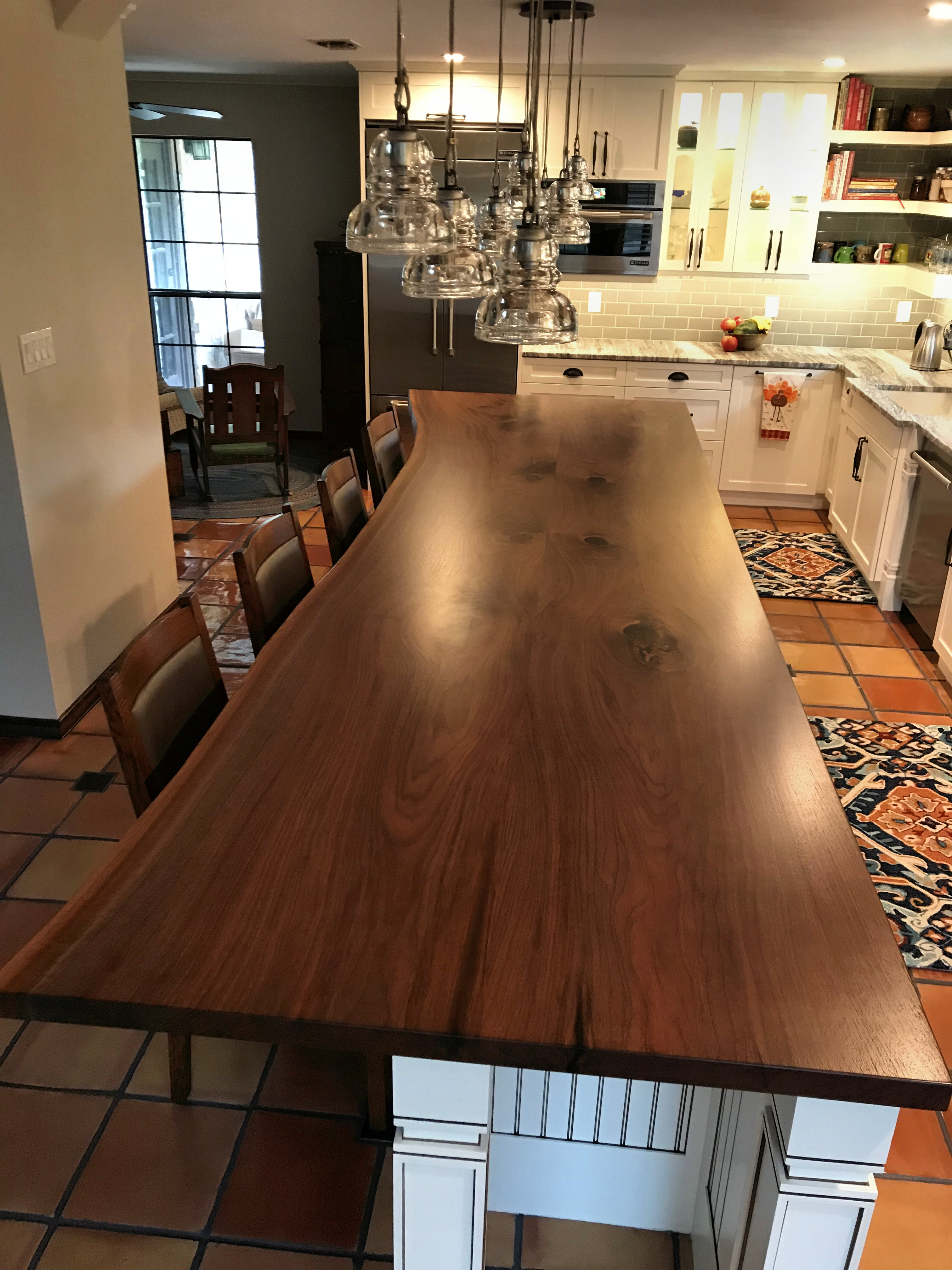 http://www.devoswoodworking.com/images/dcw/photo-gallery/wood-countertops/wood-countertops-slab-walnut-photos/slab-walnut-wood-countertops-img059.jpg