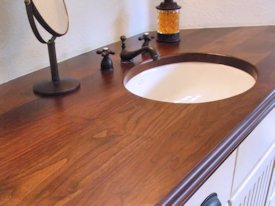 Walnut face grain wood vanity countertop.