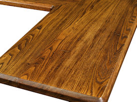 Reclaimed Wormy Chestnut face grain countertop.  Stained with a Waterlox Satin Finish.