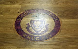 Custom Purpleheart, Walnut and White Oak inlay set into a Face Grain White Oak table top.