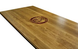 Custom Purpleheart, Walnut and White Oak inlay set into a Face Grain White Oak table top.
