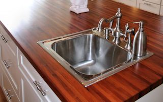 Edge Grain Mesquite Island Top with drop in sink and Waterlox finish