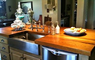 Face Grain Reclaimed Longleaf Pine Island Top with farm sink and Waterlox finish
