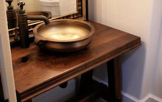 Face Grain Walnut Vanity with vessel sink and Waterlox finish