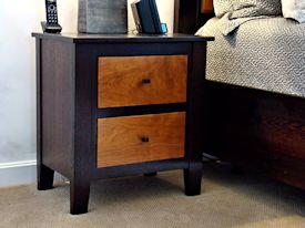 Custom Wenge and Cherry panel bed with matching night stands.